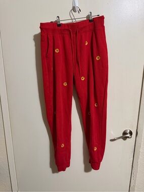 Reflex Red Sweatpants with Yellow Daisy Accents